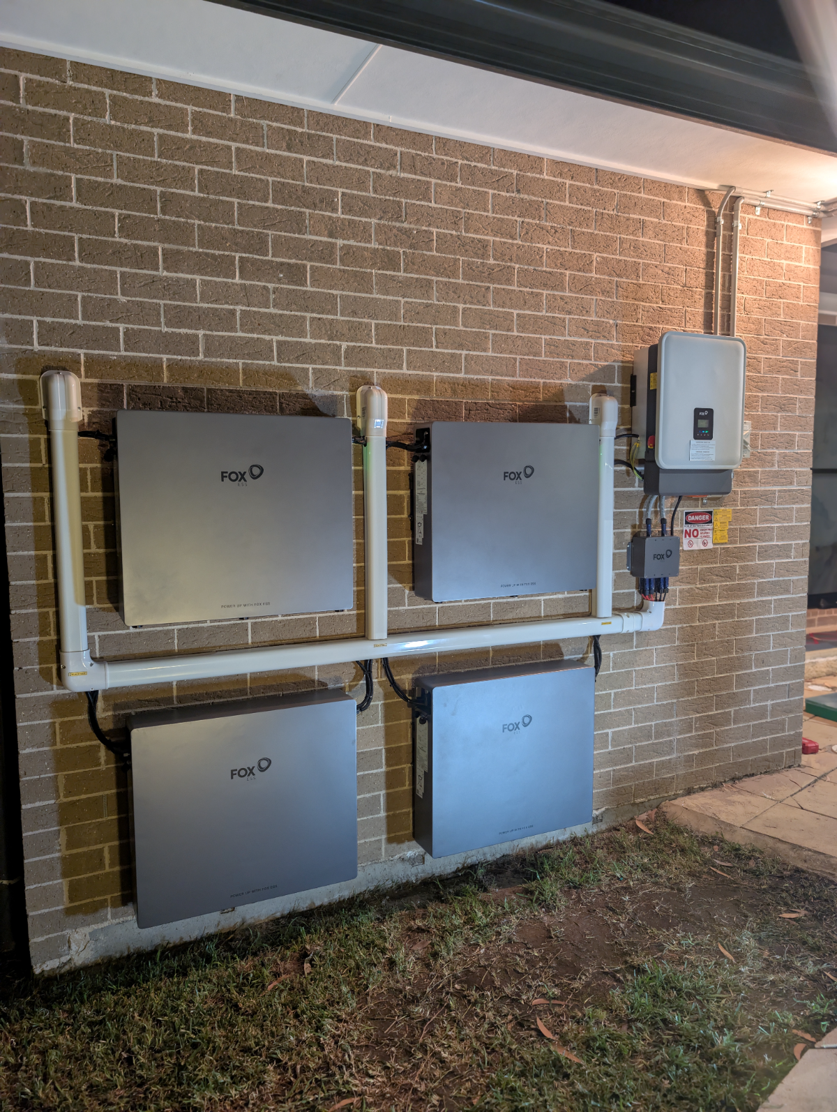 Fox ESS battery wall install four-unit stack with hybrid inverter, Sydney